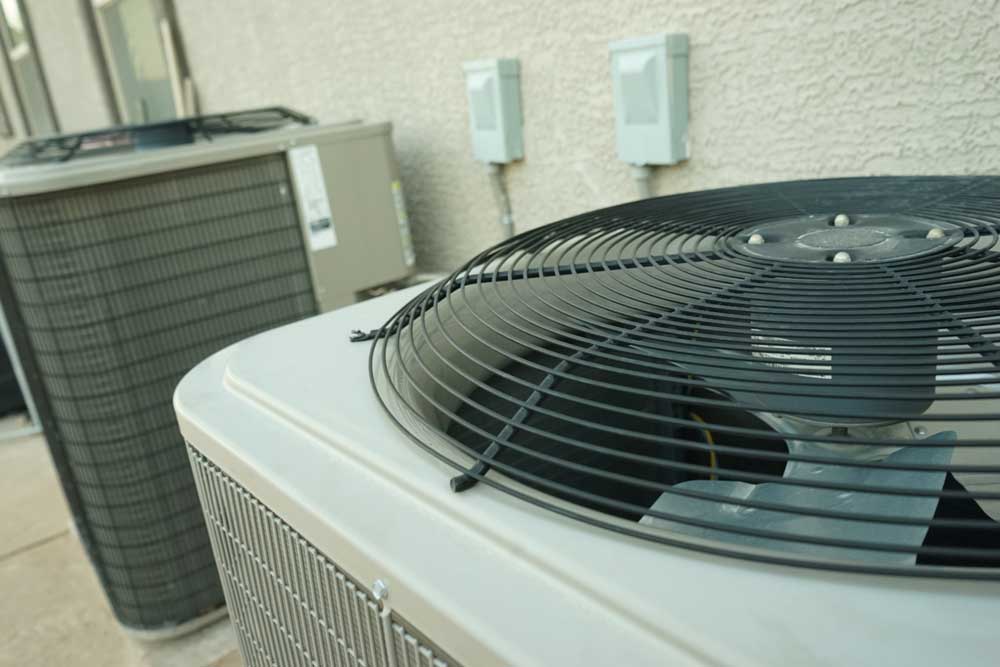 Close-up of an outdoor air conditioning condenser unit